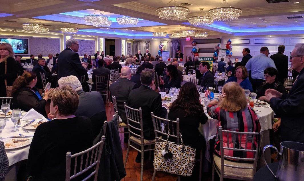 Supporters and sponsors wait for Suffolk County Executive Candidate John M. Kennedy to speak at his campaign kickoff event at Watermill Caterers in Smithtown on May 13.