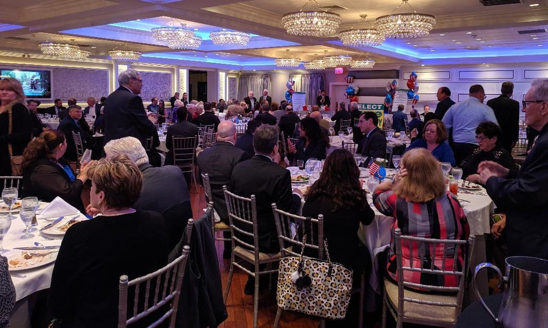 Supporters and sponsors wait for Suffolk County Executive Candidate John M. Kennedy to speak at his campaign kickoff event at Watermill Caterers in Smithtown on May 13.